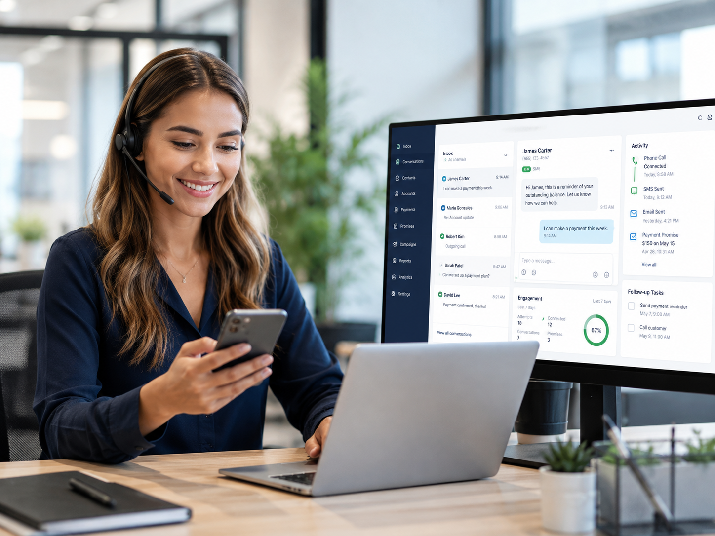 Professional reviewing the Debtcol Pro multi-channel communication dashboard on a desktop monitor while holding a mobile phone